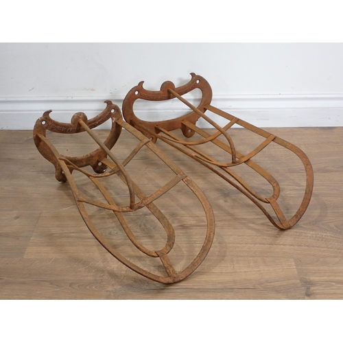 1468 - Two antique metal Saddle Racks by Cottam & Co., Winsley Street, London