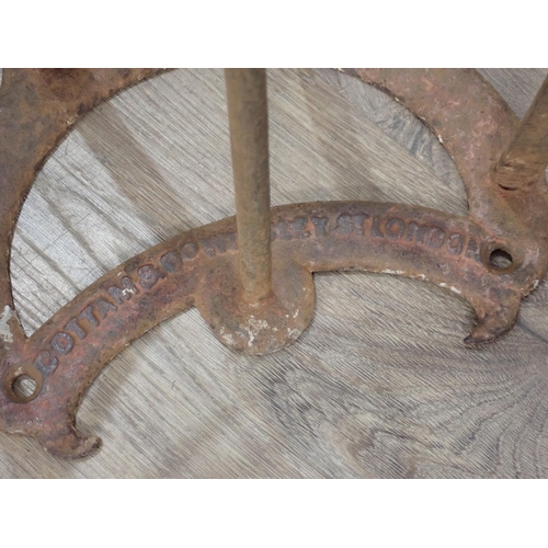 1468 - Two antique metal Saddle Racks by Cottam & Co., Winsley Street, London