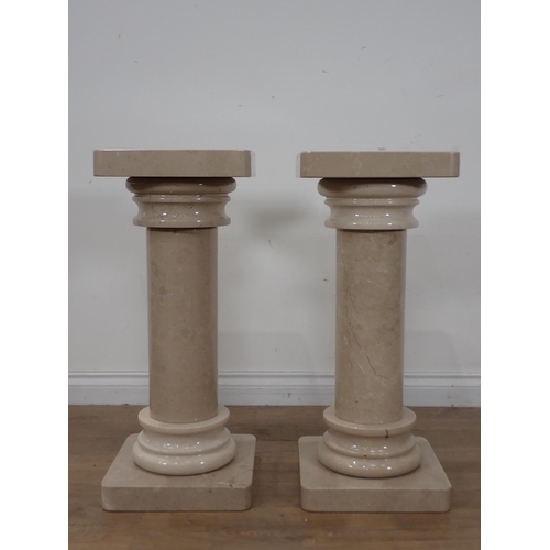 61 - A pair of marble Plant Stands with square tops 2ft 4in H x 12in W