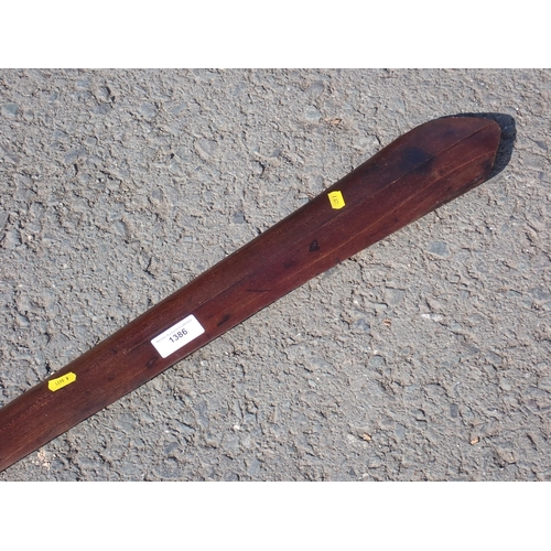 1386 - A Samoan paddle club of elongated spatulate form with a raised ridge either side extending 17” from ... 