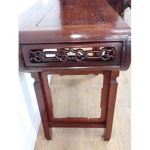 1 - A Chinese hardwood Serving Table with carved and pierced frieze, the squared supports with surface c... 