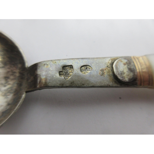 129 - An Austrian Knife, Fork and Spoon with mother-of-pearl handles, Spoon and Fork, marked, in case