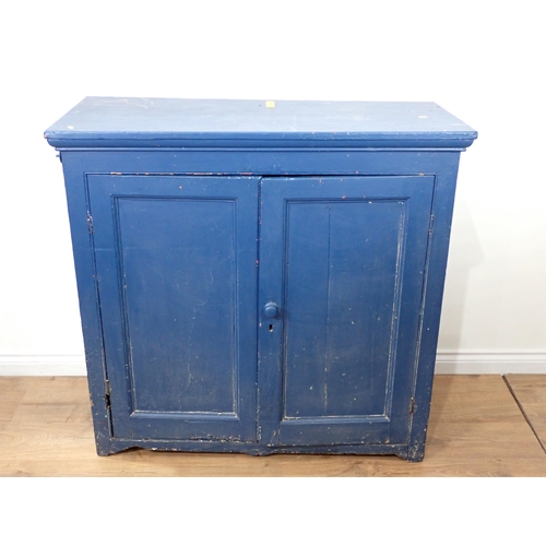 14 - A blue painted Cupboard, fitted two doors enclosing shelves, 3ft 8in W x 3ft 6in H x 1ft 7in deep