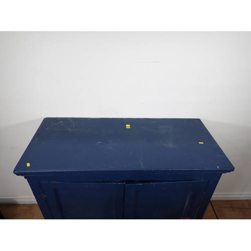 14 - A blue painted Cupboard, fitted two doors enclosing shelves, 3ft 8in W x 3ft 6in H x 1ft 7in deep