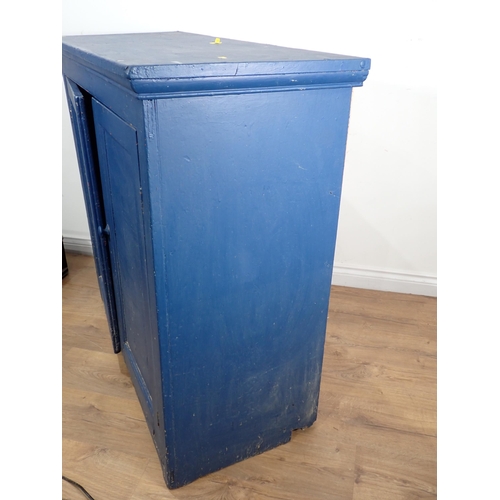 14 - A blue painted Cupboard, fitted two doors enclosing shelves, 3ft 8in W x 3ft 6in H x 1ft 7in deep