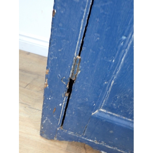 14 - A blue painted Cupboard, fitted two doors enclosing shelves, 3ft 8in W x 3ft 6in H x 1ft 7in deep