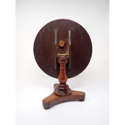 146 - A 19th Century mahogany apprentice piece model of a Breakfast Table with moulded tilting top on balu... 