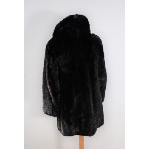 151 - A Mink Jacket labelled; Christian Dior Boutique Fourrure, Paris, approx size 10 and an Astrakhan fur... 