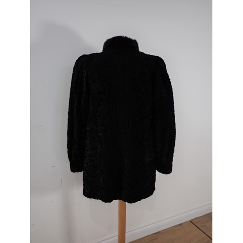 151 - A Mink Jacket labelled; Christian Dior Boutique Fourrure, Paris, approx size 10 and an Astrakhan fur... 