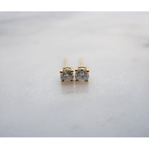 153 - A pair of Diamond ear Studs each claw-set brilliant-cut stone, total diamond weight 0.40cts, in 18ct... 