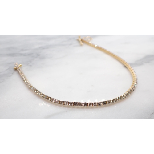 181 - A Diamond Tennis Bracelet claw-set throughout brilliant-cut stones, total diamond weight 2.75cts, on... 