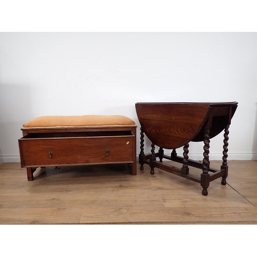 239 - An oak dropleaf Table on barley twist supports and an oak Box Seat fitted single drawer