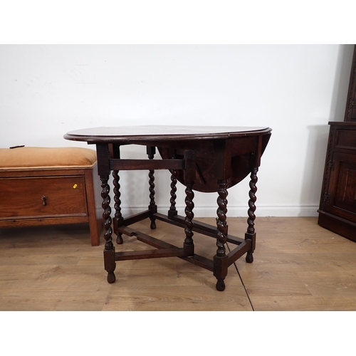 239 - An oak dropleaf Table on barley twist supports and an oak Box Seat fitted single drawer