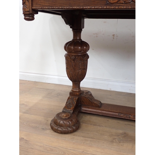 24 - An carved oak Dining Suite including Sideboard, drawleaf Table and four Chairs