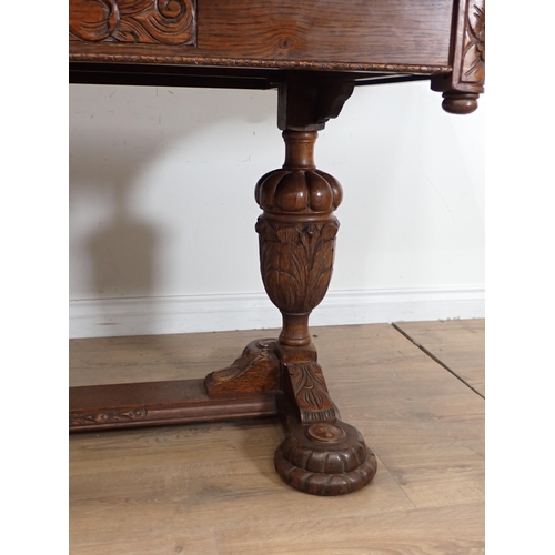 24 - An carved oak Dining Suite including Sideboard, drawleaf Table and four Chairs