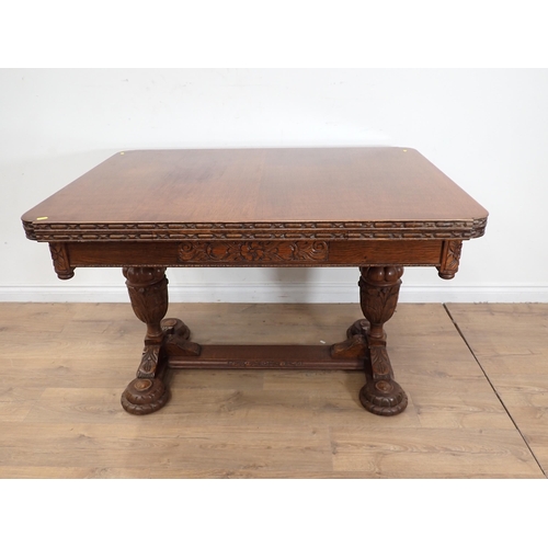 24 - An carved oak Dining Suite including Sideboard, drawleaf Table and four Chairs