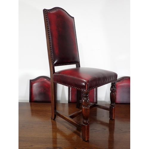 240 - An oak draw leaf Refectory Table 6ft W x 2ft 6in H and eight red leather covered oak Dining Chairs