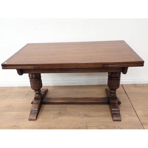 254 - An oak draw leaf Dining Table 4ft 6in W x 2ft 6in H and six brown leather effect covered Dining Chai... 