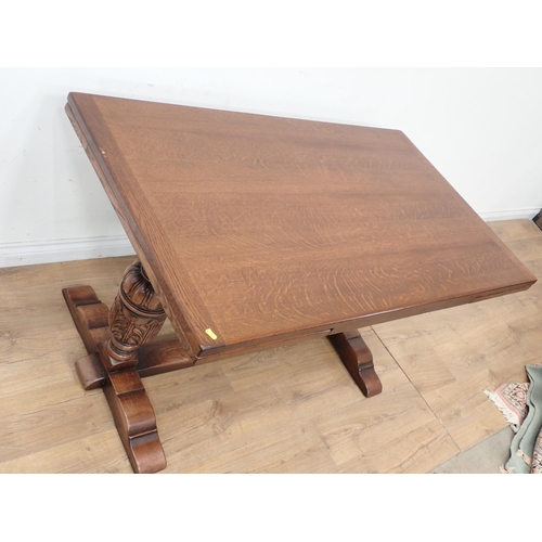 254 - An oak draw leaf Dining Table 4ft 6in W x 2ft 6in H and six brown leather effect covered Dining Chai... 