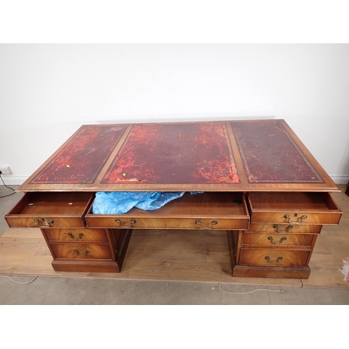 255 - A mahogany veneered Partner's Desk 6ft W x 2ft 6in H