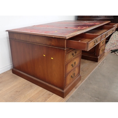 255 - A mahogany veneered Partner's Desk 6ft W x 2ft 6in H