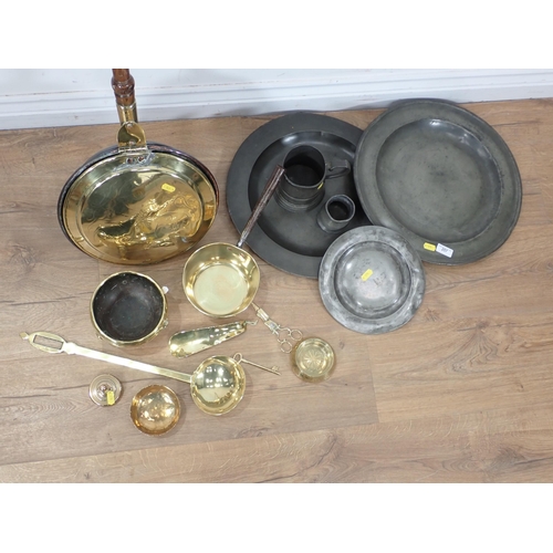 257 - An engraved brass Warming Pan, two pewter Chargers, a pewter Plate, Tankard, Measure, brass Saucepan... 