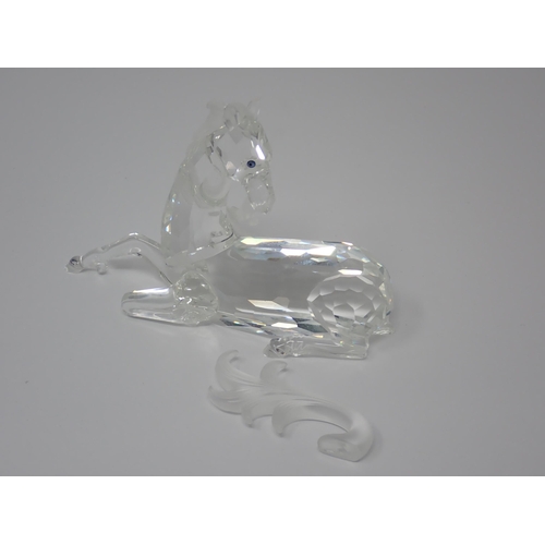 264 - A Swarovski crystal figure of a Unicorn A/F, boxed and another of a dragon, 5in A/F, boxed