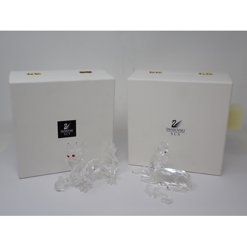 264 - A Swarovski crystal figure of a Unicorn A/F, boxed and another of a dragon, 5in A/F, boxed