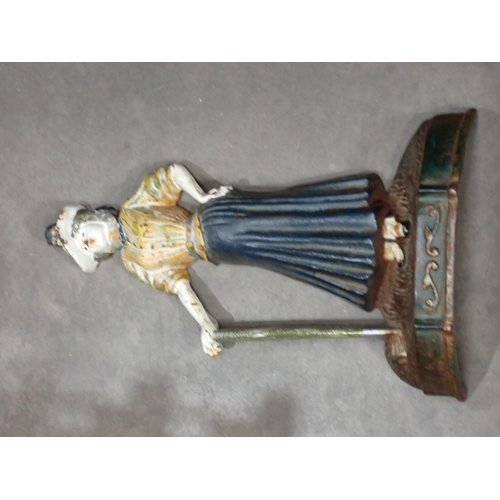 267 - A painted cast iron figural Door Stop, Candlesticks, Candelabra etc