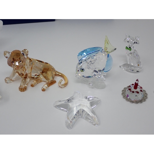 269 - A collection of Swarovski crystal Figures, including Father Christmas, animals, Pendants, Ballerina ... 