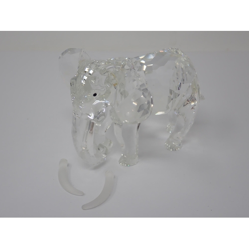 294 - Two Swarovski crystal models including an elephant and a Bear, both boxed