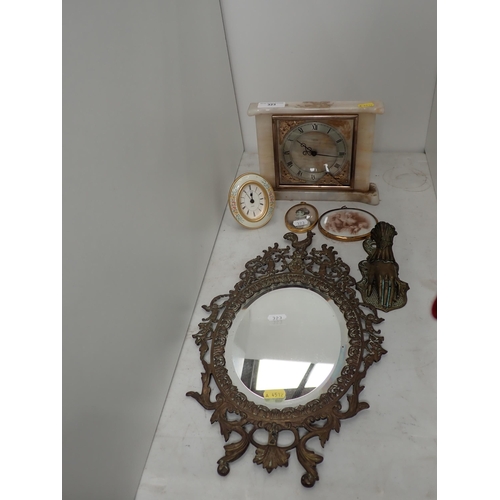 323 - A brass framed oval Wall Mirror, 17in H, a brass 