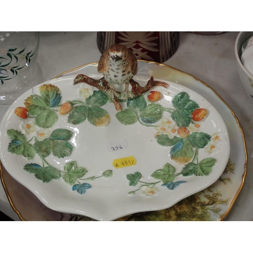 324 - A Strawberry Dish mounted with a bird, A/F, a Cranberry glass Jug, a pair of figural Lamps (failed P... 