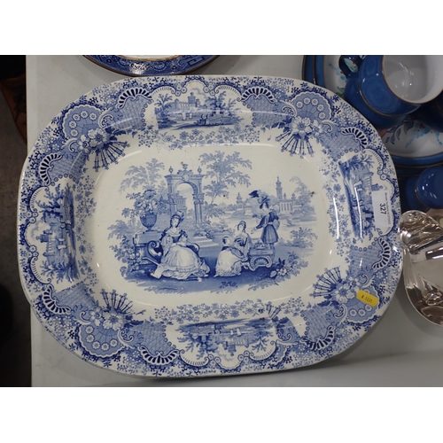 327 - Three blue and white Meat dishes, a pair of Continental Figures, a blue glass Vase, metal Storage Ja... 