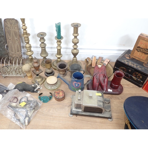 334 - A lacquered Jewellery box, brass Candlesticks, a Cap etc