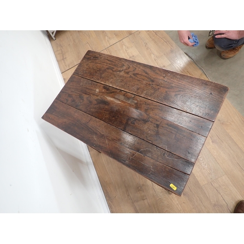 34 - A Georgian oak Lowboy fitted three frieze drawers above a shaped frieze on chamfered squared support... 