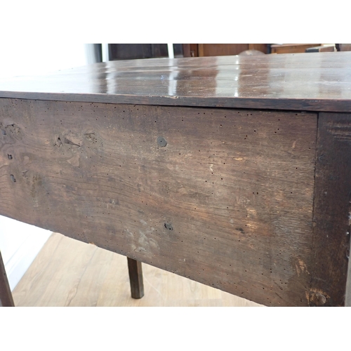 34 - A Georgian oak Lowboy fitted three frieze drawers above a shaped frieze on chamfered squared support... 