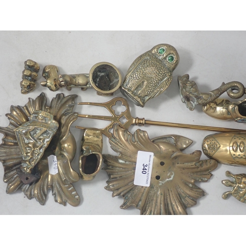 340 - A quantity of brassware including a pair of dolphin Candle Sconces, Vase, etc