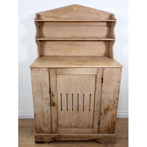 36 - A pine Food Cupboard, with raised back and fitted pierced single door, 5ft 2in H x 3ft W