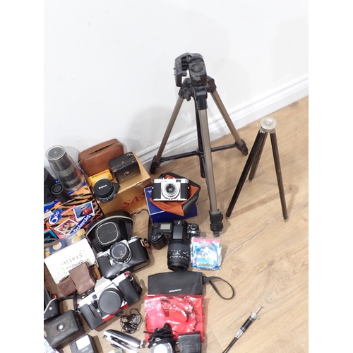 372 - A box of Photographic Equipment including Cameras, Lenses, Tripod, etc.