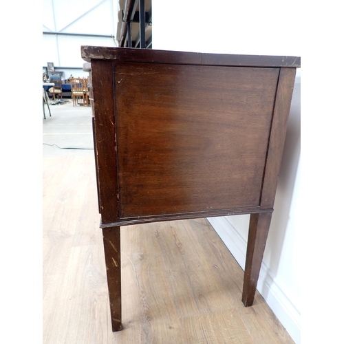 390 - A mahogany veneered serpentine fronted Sideboard fitted four drawers