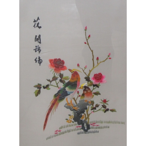 441 - TWENTIETH CENTURY JAPANESE SCHOOL. Exotic birds on branches, embroidered silks, 14½ x 10¼in; a pair ... 