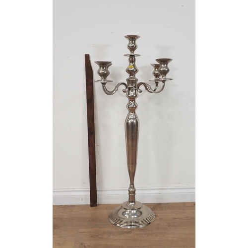 456 - A white metal floor standing four branch Candelabra 3ft 3in H