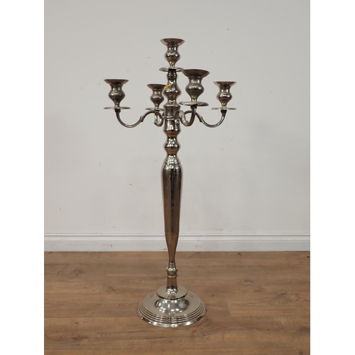 456 - A white metal floor standing four branch Candelabra 3ft 3in H