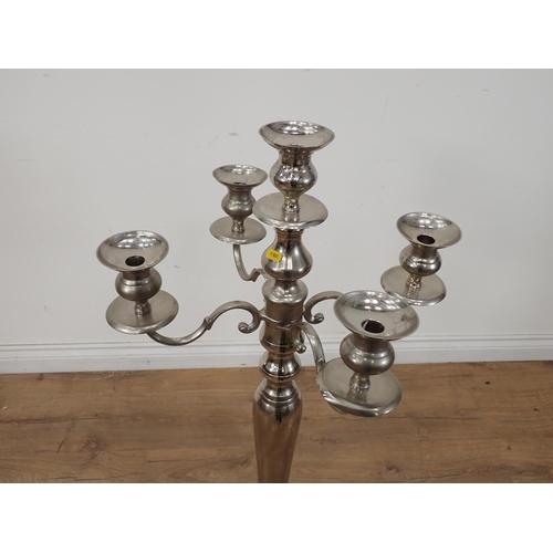 456 - A white metal floor standing four branch Candelabra 3ft 3in H