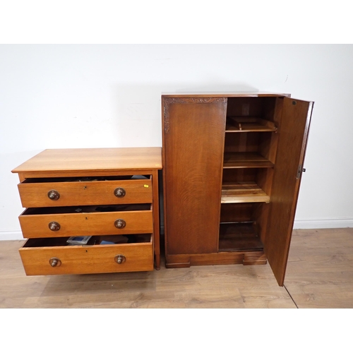 463 - An oak Chest of three drawers and an oak two door Cupboards