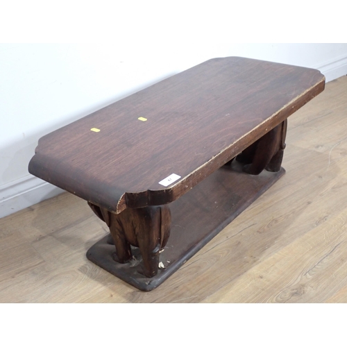 47 - A hardwood Stool with elephant supports 3ft W x 1ft 2in H