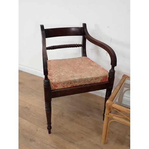 481 - A 19th Century mahogany Elbow Chair with rope twist back and a glass topped bamboo Coffee Table