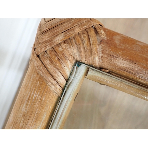 481 - A 19th Century mahogany Elbow Chair with rope twist back and a glass topped bamboo Coffee Table