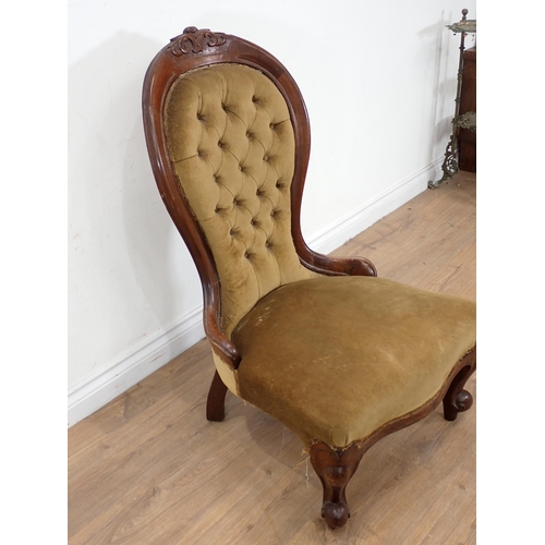 482 - A Victorian walnut framed green button back Nursing Chair